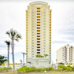 exterior building photo of Colonnades condominium complex in Gulf Shores, Alabama