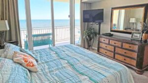 master bedroom overlooking private balcony, beach and gulf of Mexico