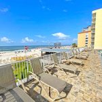 Colonnades-Condo-Gulf-Shores-pool-chairs